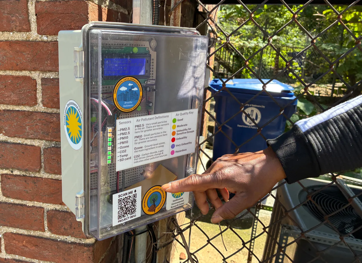 The Breathe Baltimore air quality sensors feature lights on the front that show real-time information on air pollutants.